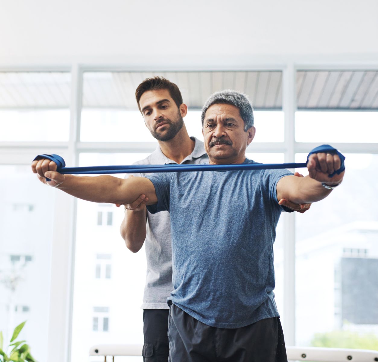 Image of PT working with patient